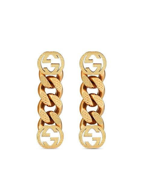 gucci gold logo earrings|Gucci interlocking earrings.